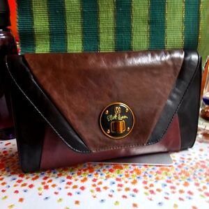 Elliot Lucca medium sized mixed grain/color leather clutch